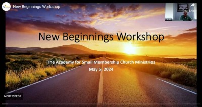 Screenshot from video: Slide with image of long road heading into a sunrise with "New Beginnings" title on screen and Carl Ellis in inset image in upper right corner. 